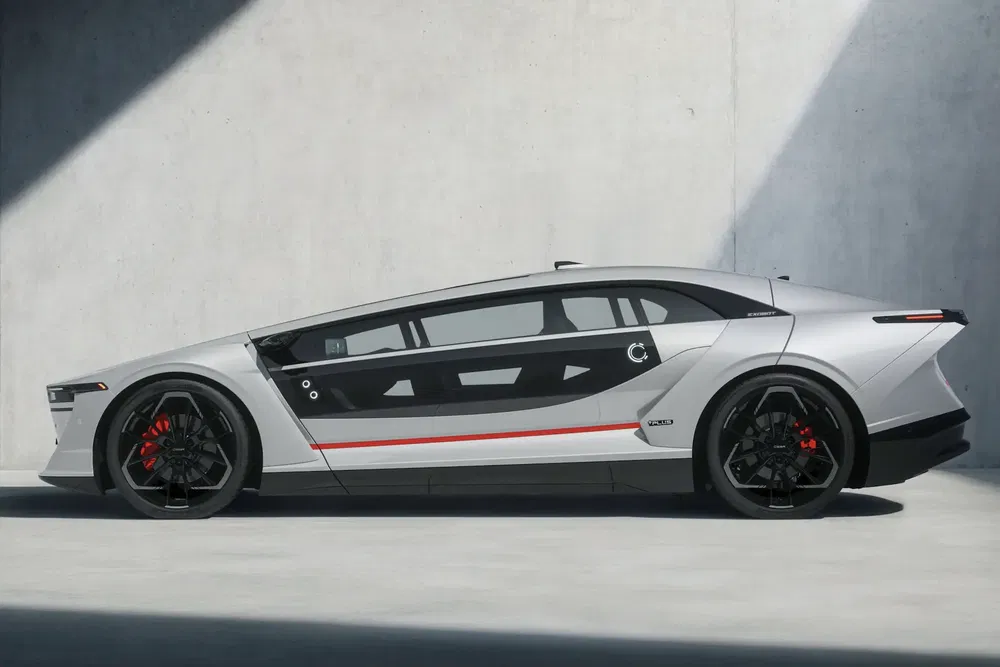 Hyundai N Vision 74 conceptauto, futuristisch ontwerp, rode en zwarte wielen, minimalistische omgeving.