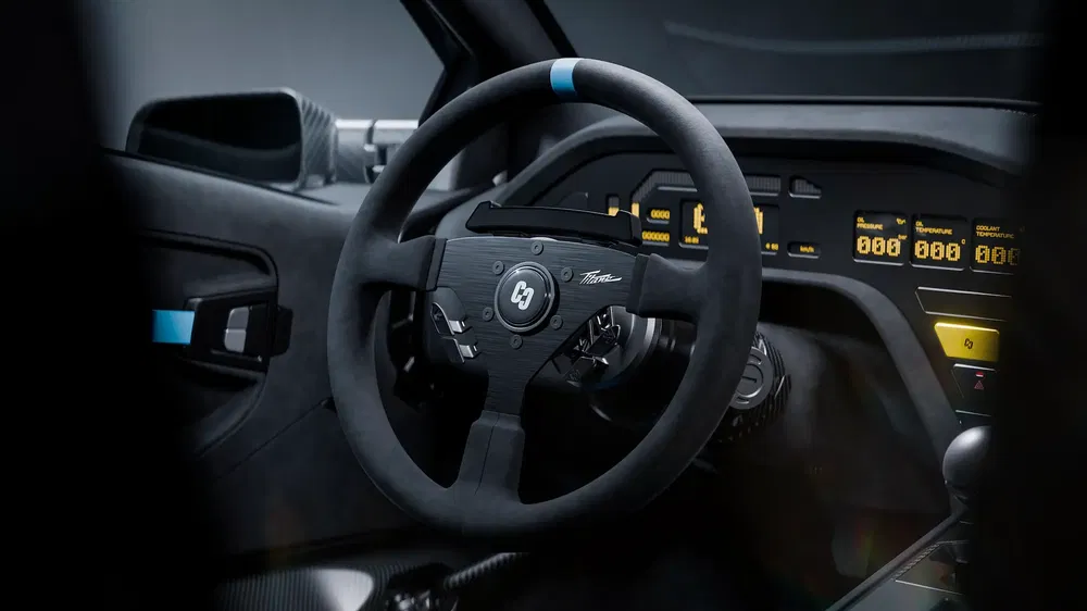 Dashboard van Czinger hypercar met sportstuur en geïntegreerde digitale schermen.