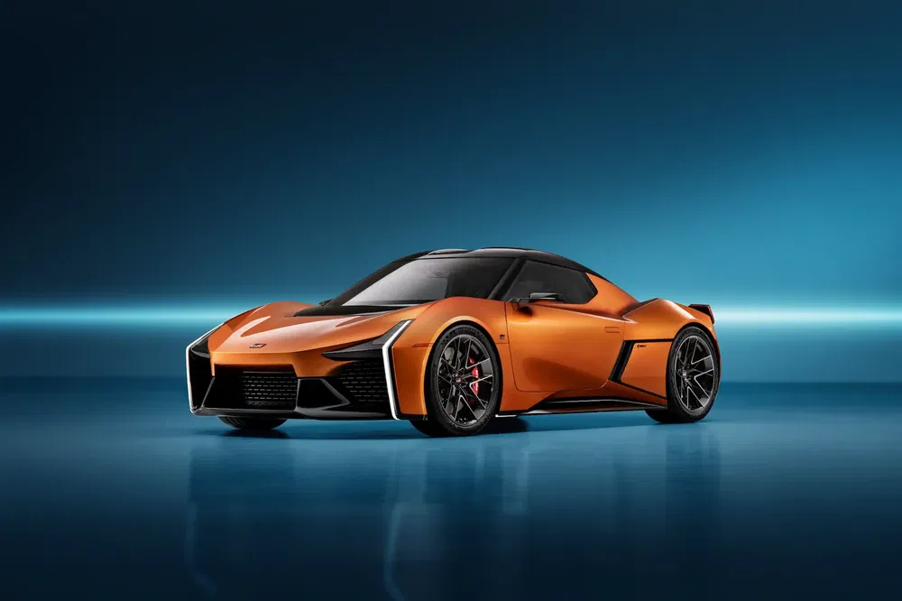 {"fr":"Supercar orange moderne avec design élégant sur fond bleu brillant.","nl":"Moderne oranje supercar met slank ontwerp tegen een helderblauwe achtergrond."}