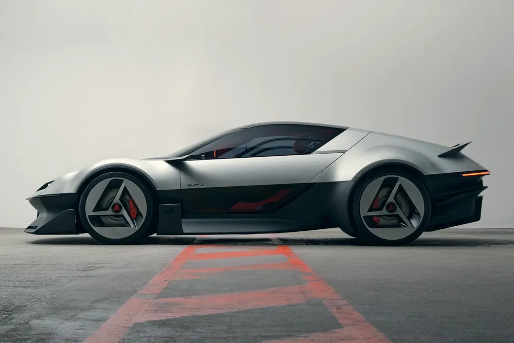 Futuristische Lamborghini conceptauto, gestroomlijnd profiel en strakke lijnen op neutrale achtergrond.