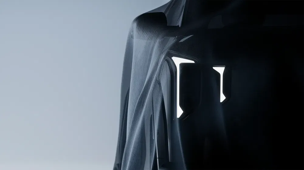 {"fr":"Teaser du SUV électrique Polestar 3 illuminé sous une couverture en studio.","nl":"Teaser van verlichte Polestar 3 elektrische SUV bedekt met doek in studio."}