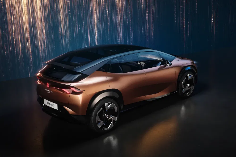 {"fr":"Renault Morphoz concept car, SUV futuriste brun avec éclairage moderne et extérieur élégant.","nl":"Renault Morphoz conceptauto, futuristische SUV in brons met moderne verlichting en gestroomlijnd ontwerp."}