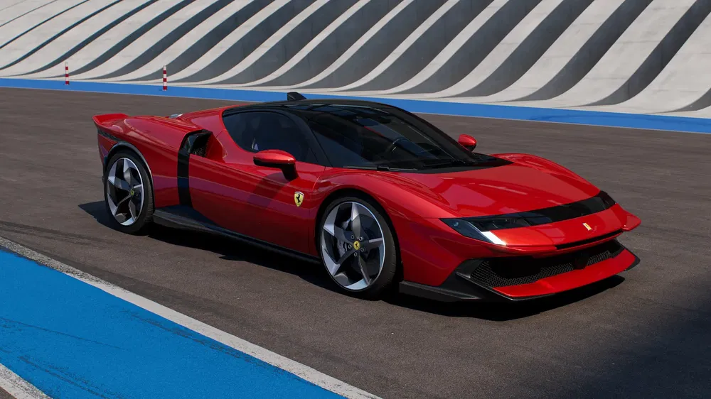 Ferrari rouge sur piste avec motif de lignes bleues et blanches en arrière-plan.