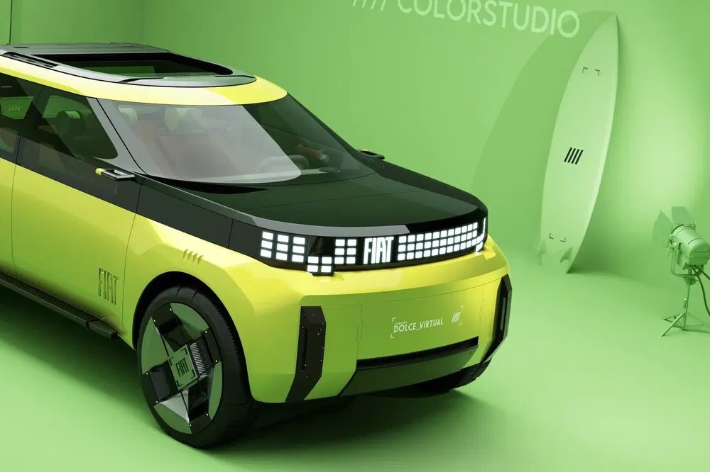 {"fr":"Concept car Fiat moderne vert et noir avec design futuriste dans studio vert.","nl":"Moderne groene en zwarte Fiat conceptwagen met futuristisch design in groene studio."}