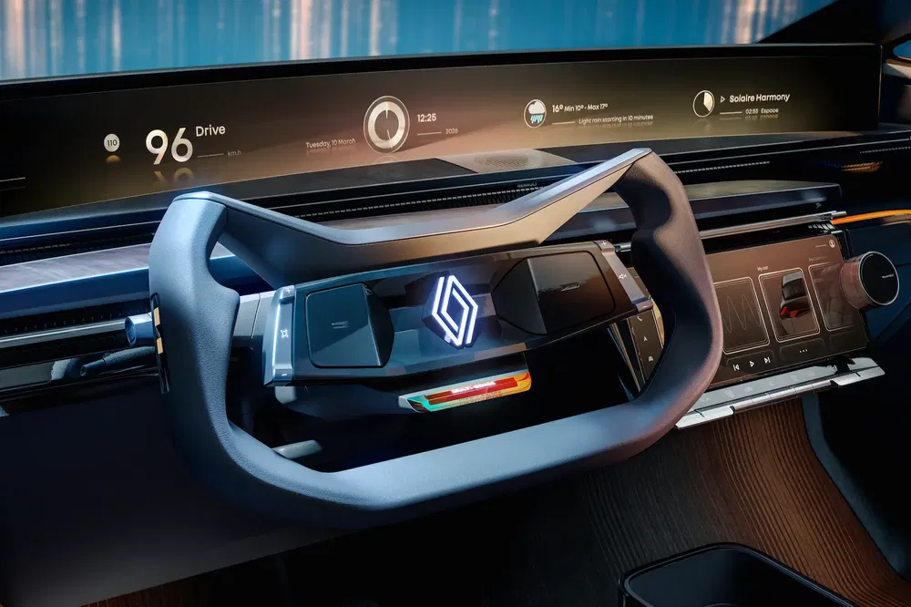 Futuristisch Renault stuurwiel met geïntegreerd digitaal scherm, geavanceerde technologie en innovatief ontwerp.