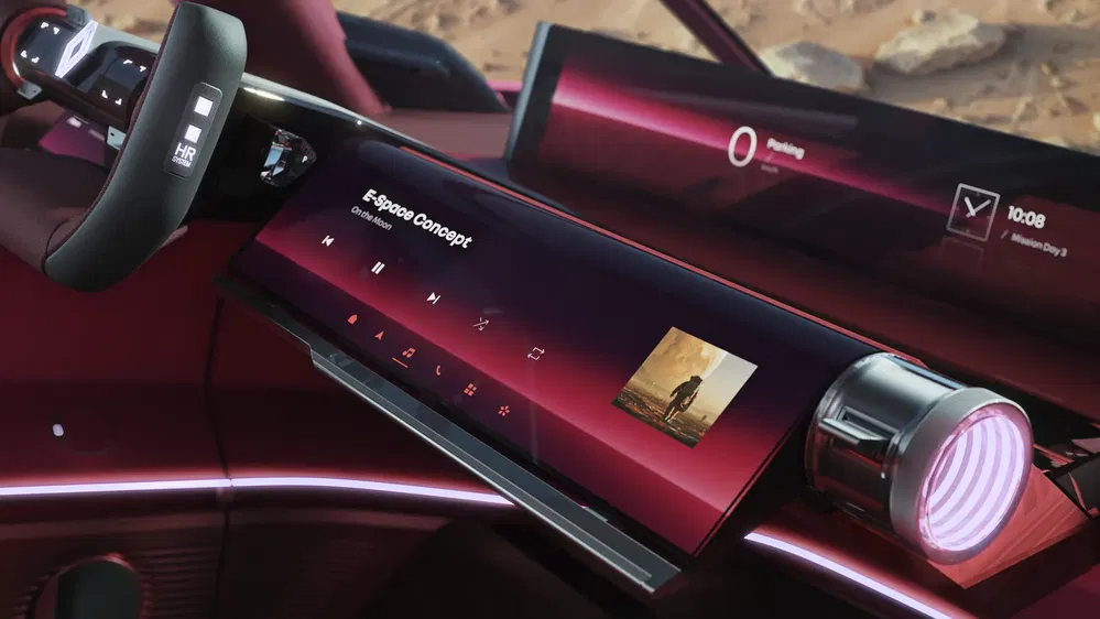 Tableau de bord numérique du concept-car E-Space avec écran tactile moderne et éclairage LED.