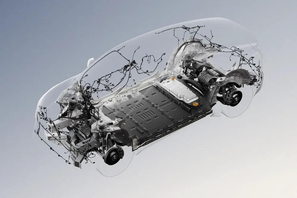 Illustration de l'architecture électrique d'une voiture électrique moderne avec batterie visible.