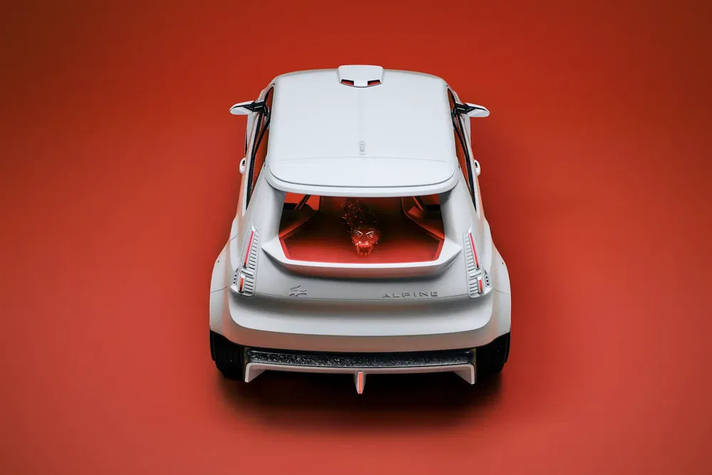 {"fr":"Concept-car Alpine vu de l'arrière sur fond rouge, design moderne et sportif.","nl":"Achteraanzicht van Alpine conceptauto op rode achtergrond, modern en sportief ontwerp."}