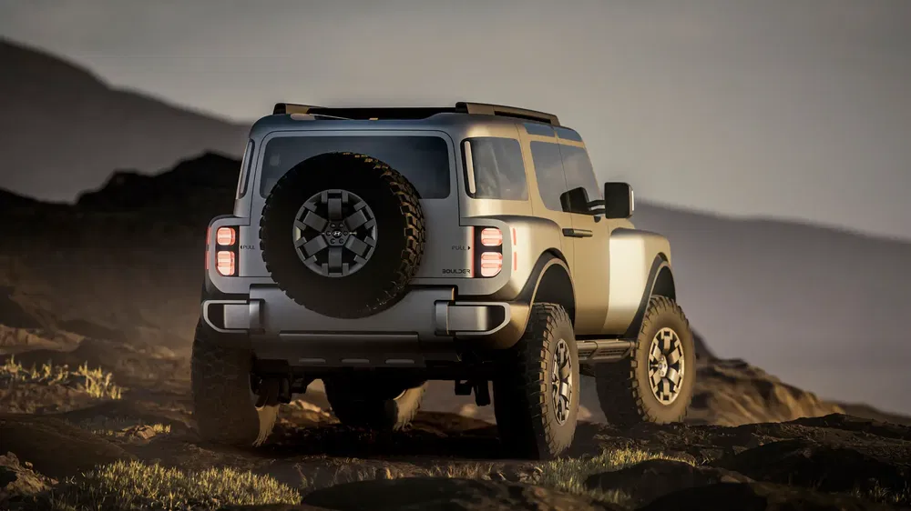 {"fr":"Ford Bronco sur un sentier rocailleux au crépuscule, ambiance aventure en plein air.","nl":"Ford Bronco op een rotsachtig pad bij schemering, avontuurlijke buitenstemming."}