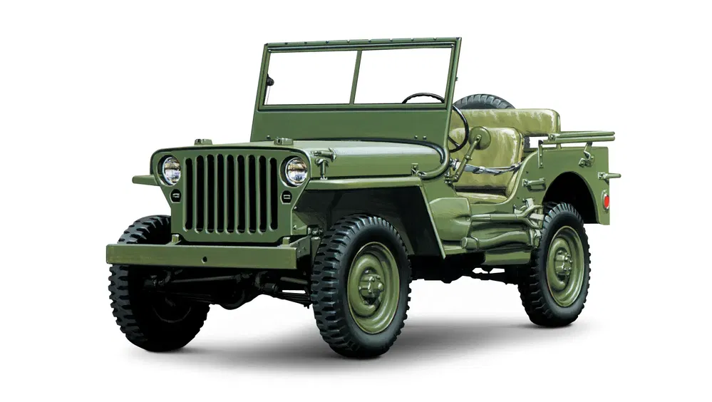 Klassieke groene militaire Jeep met opgevouwen motorkap, ronde koplampen en reservewiel.