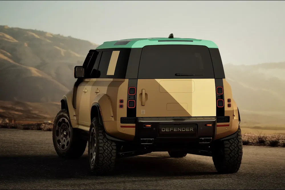 Land Rover Defender en arrière-plan montagneux, deux tons de couleur, design robuste.