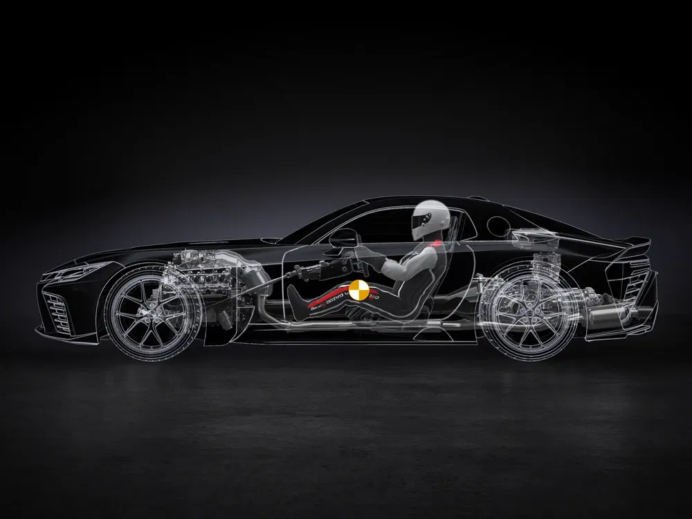 Technische illustratie van Lexus LC met crashtestdummy in rijpositie.