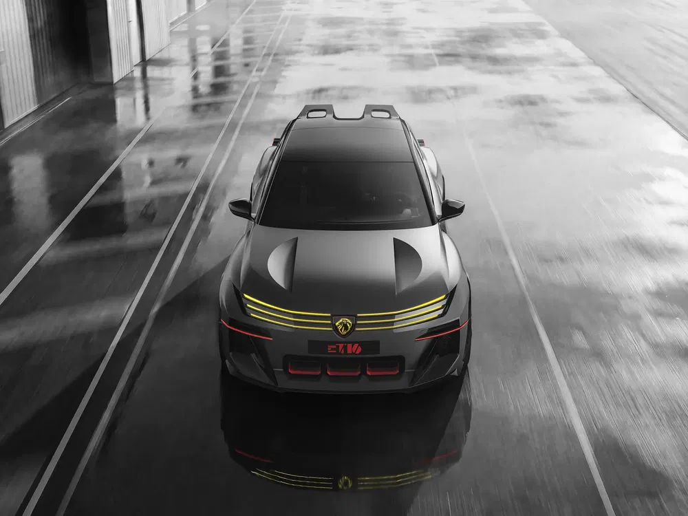 Vue avant d'un concept car Lion électrique sur une piste mouillée.