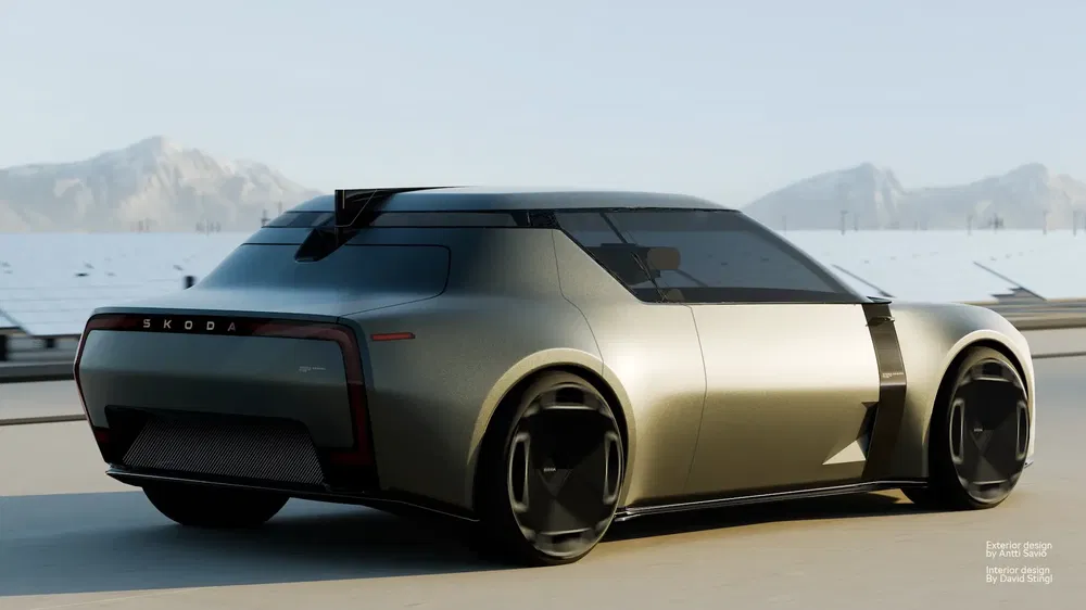 Concept car Škoda, design futuriste, roulant sur route ensoleillée avec montagnes en arrière-plan.