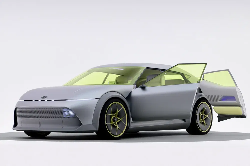 {"fr":"Concept car Hyundai moderne avec portes ouvertes et design futuriste.","nl":"Moderne Hyundai conceptauto met open deuren en futuristisch ontwerp."}