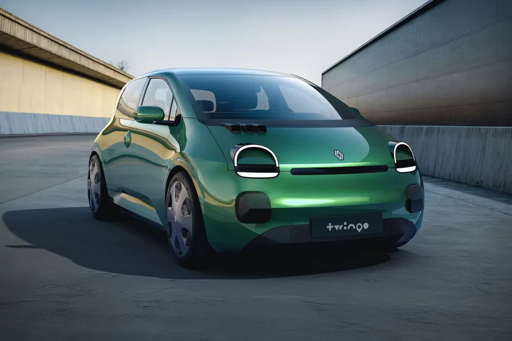{"fr":"Concept-car Renault Twingo vert émeraude moderne sur une route déserte.","nl":"Moderne groene Renault Twingo conceptauto op een verlaten weg."}
