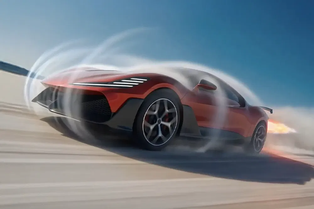 Voiture de sport rouge filant à grande vitesse sur une piste désertique.