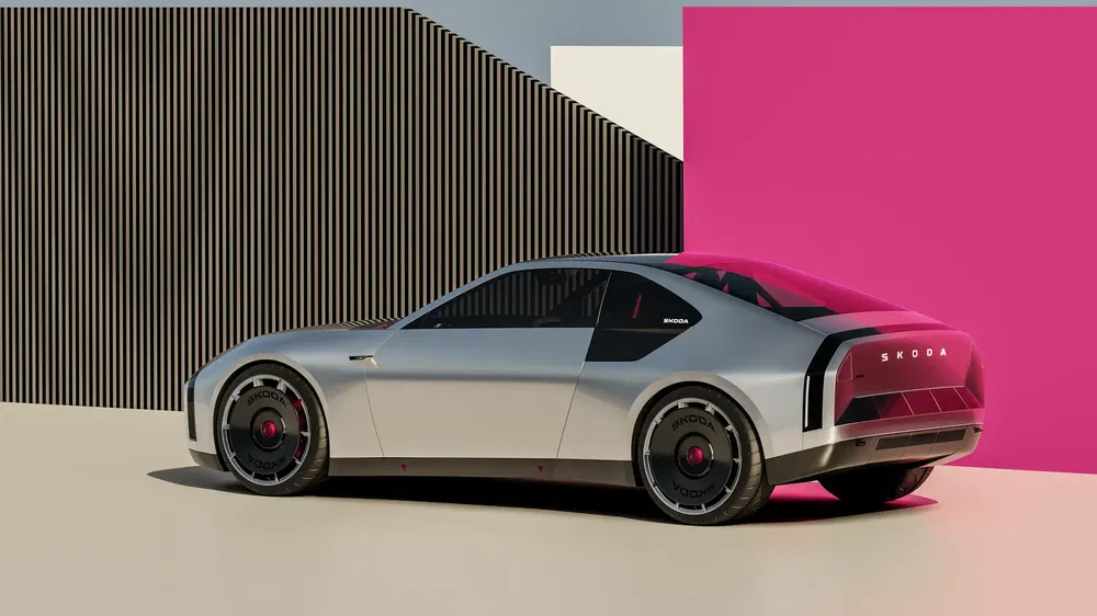 {"fr":"Concept car Skoda Profile avec design futuriste et arrière distinctif, contre fond coloré vibrant.","nl":"Skoda conceptauto met futuristisch design en opvallende achterkant tegen levendige kleurrijke achtergrond."}
