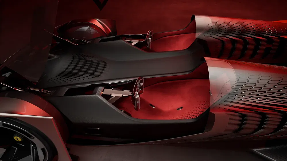 Conceptauto met futuristisch rood en zwart interieur en innovatief aerodynamisch ontwerp.