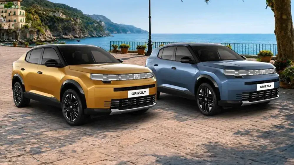 {"fr":"Fiat Grizzly 2023 or et bleu garées côte à côte sur une promenade côtière.","nl":"Fiat Grizzly 2023 goud en blauw naast elkaar geparkeerd aan kustpromenade."}