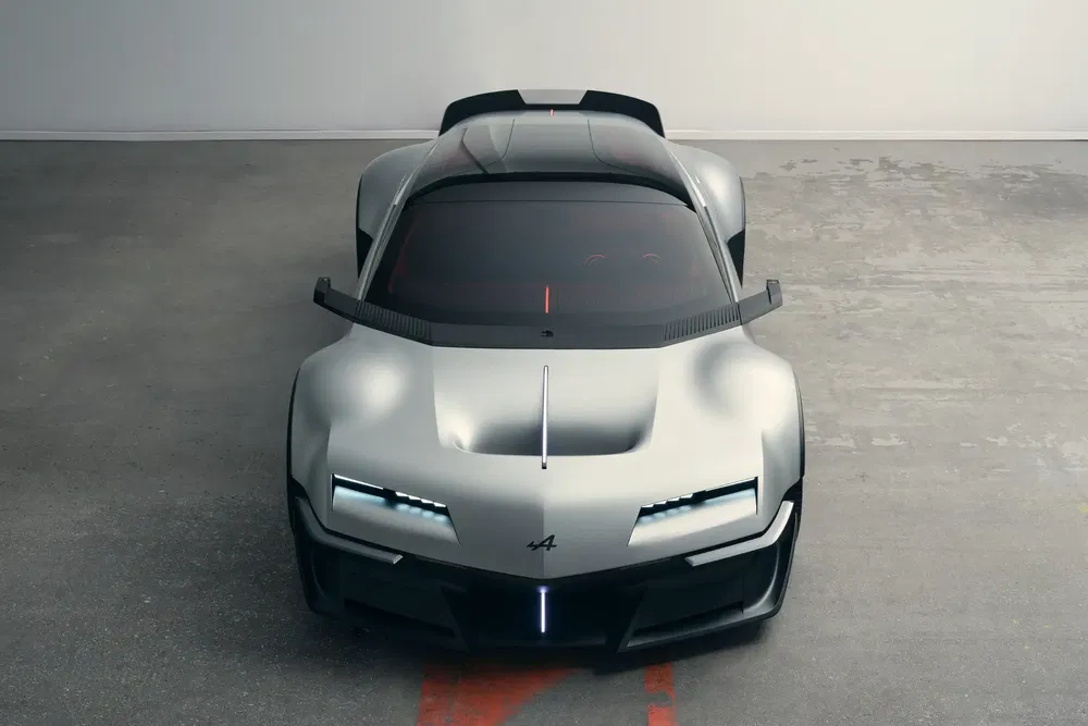 Toekomstige Alpine sportwagen met aerodynamisch ontwerp tegen neutrale achtergrond.