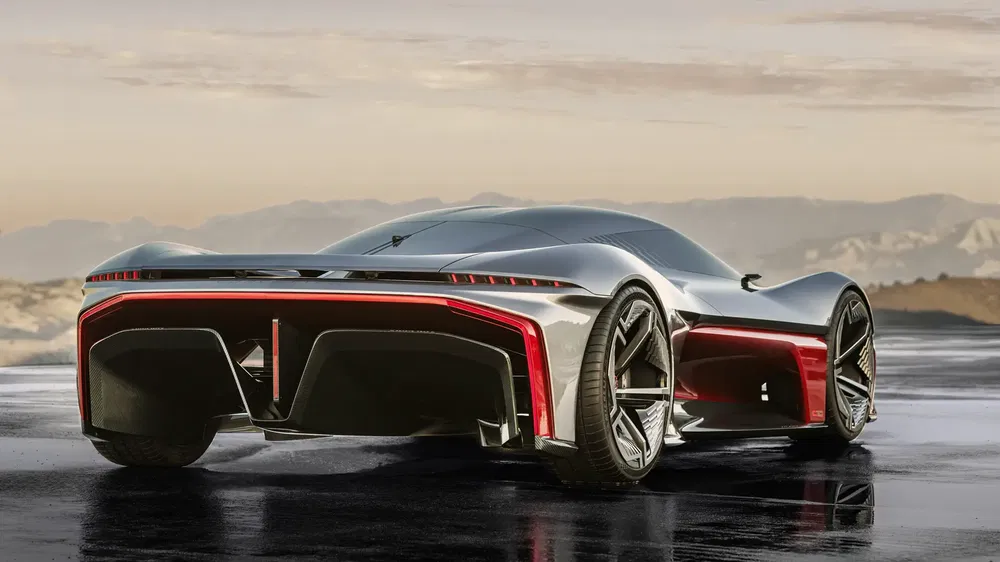 Hypercar futuriste avec design aérodynamique et éclairage LED arrière sur route panoramique.