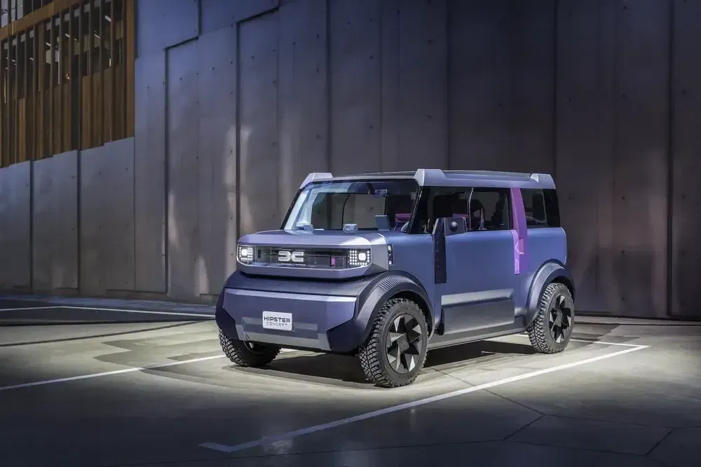Moderne Hipster E1 SUV conceptauto in een stijlvol verlichte parkeerplaats.