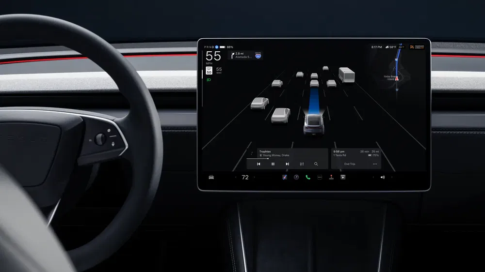 Tesla digitaal dashboard met verkeersgrafiek en moderne gebruikersinterface.
