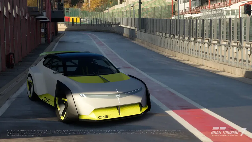 {"fr":"Concept-car futuriste Opel sur une piste de course, design avant-gardiste et couleurs vives.","nl":"Futuristische Opel conceptcar op racecircuit, vooruitstrevend ontwerp en levendige kleuren."}
